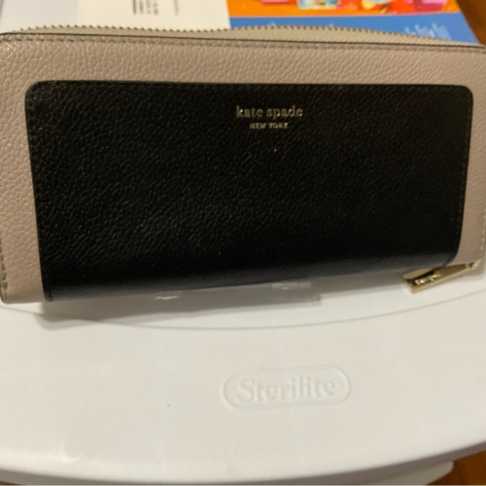 Kate Spade wallet in black and tan. NO FURTHER MARKDOWN
